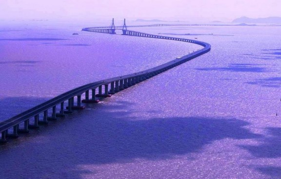 photo soleil couchant du pont de jiaozhou en chine