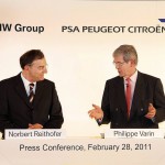 les deux patrons de bmw puis psa à droite