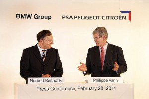 les deux patrons de bmw puis psa à droite